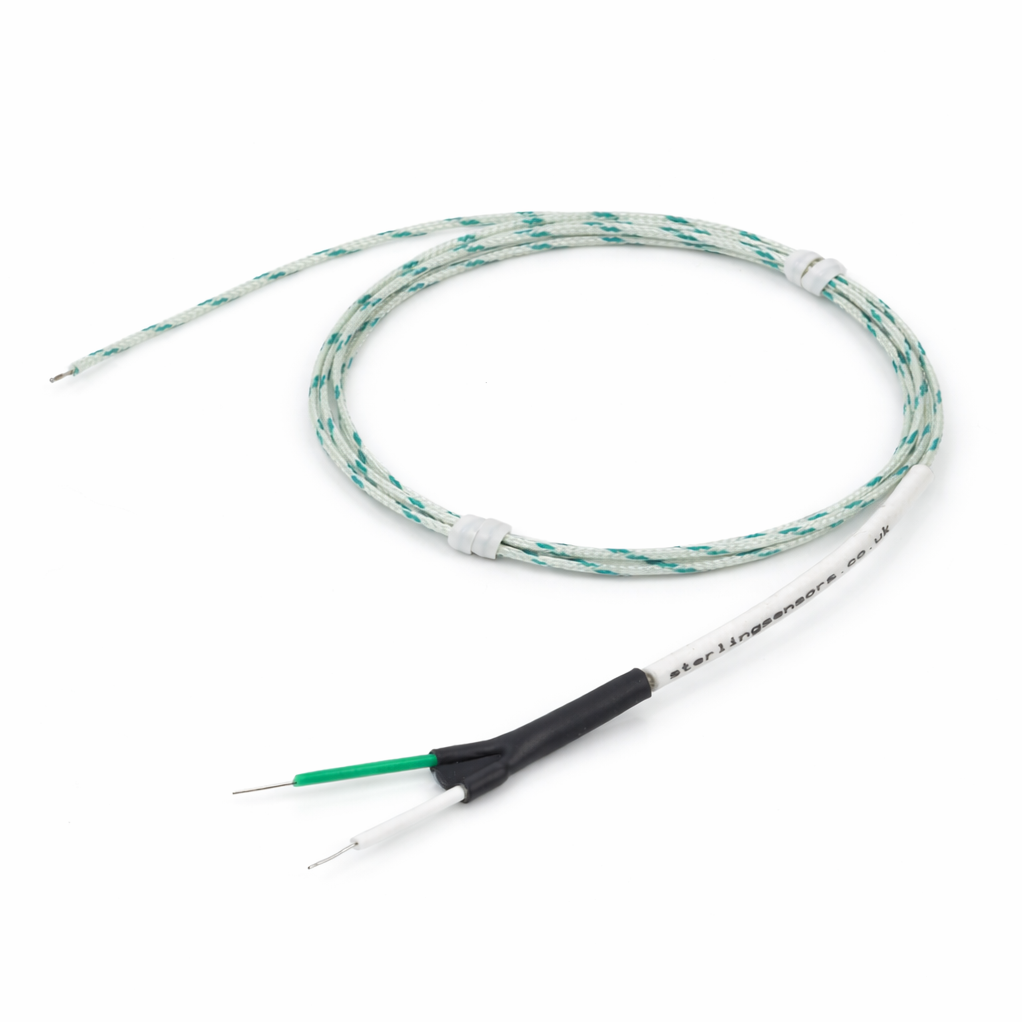 Thermocouple with green and white cable on a white background